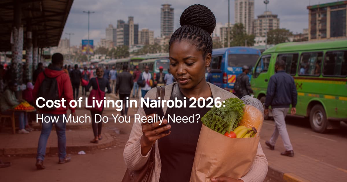 A Kenyan woman carrying groceries and checking her smartphone at a Nairobi bus station, illustrating the everyday cost of living in Nairobi.