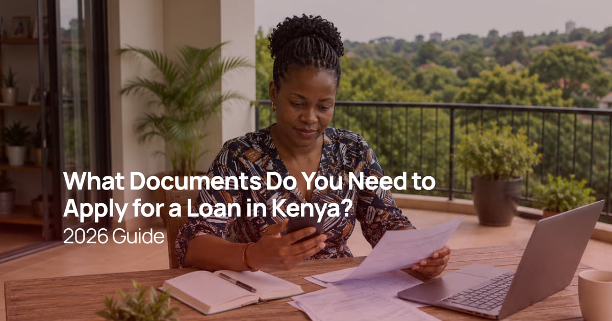 A Kenyan woman reviewing loan application documents and checking information on her smartphone before applying for a personal loan.