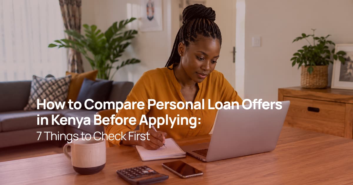 A Kenyan woman comparing personal loan offers on her laptop while making notes to choose a loan that fits her budget.