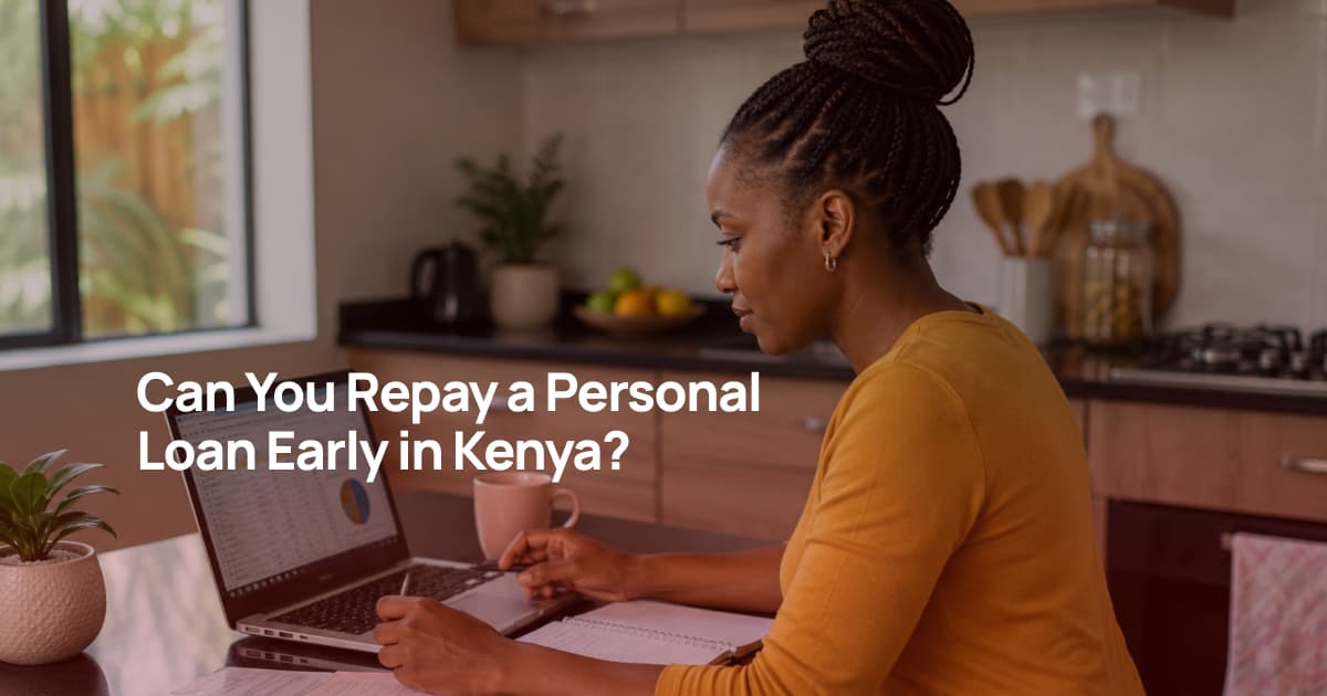Kenyan woman using a laptop and smartphone to review her personal loan before making an early repayment.