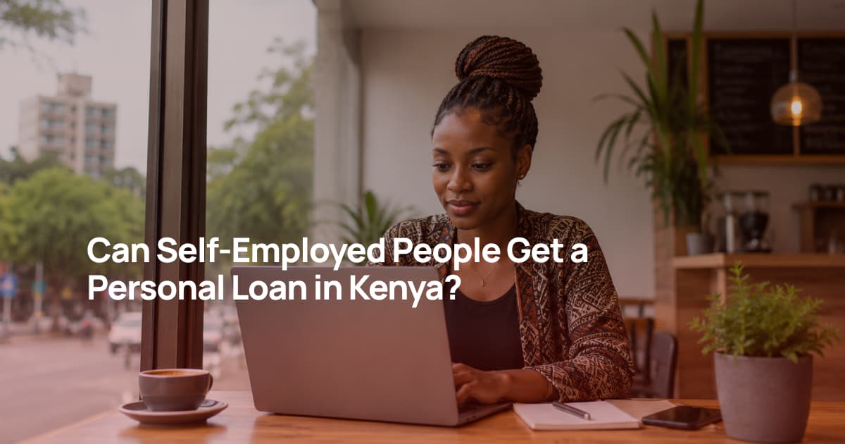 Young Kenyan self-employed woman working on a laptop in a coffee shop before applying for a personal loan.